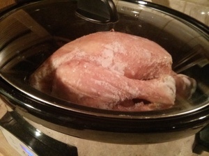 Whole, frozen chicken in the crock pot.